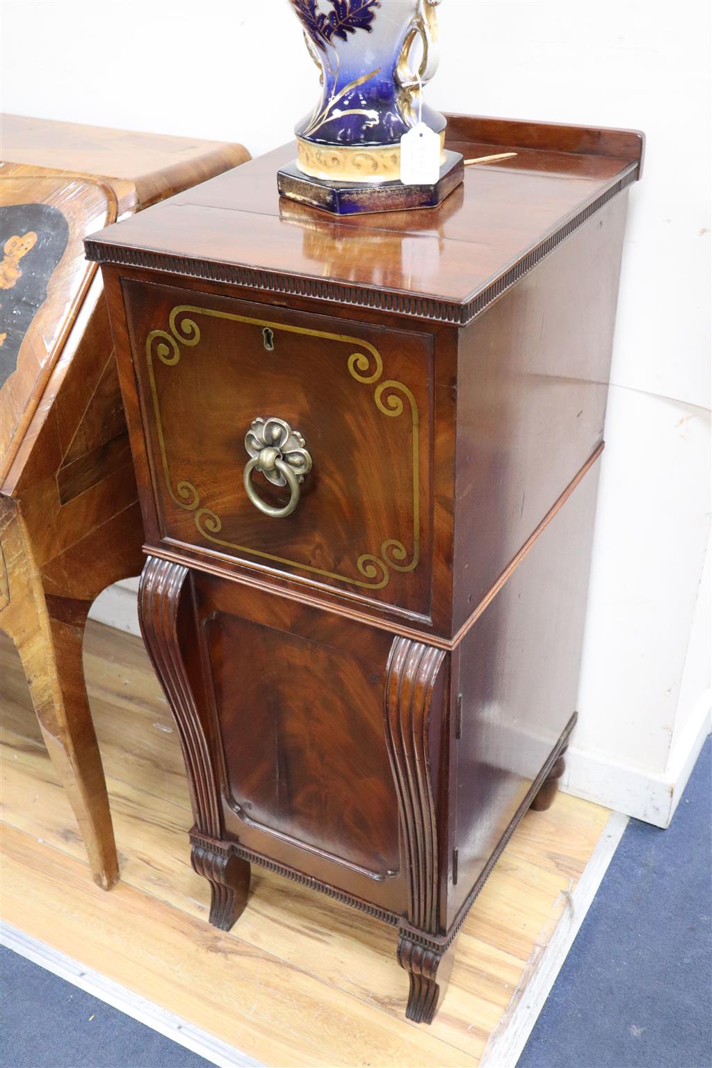 A pair of Regency brass inlaid mahogany pedestal cabinets, width 40cm, depth 46cm, height 99cm